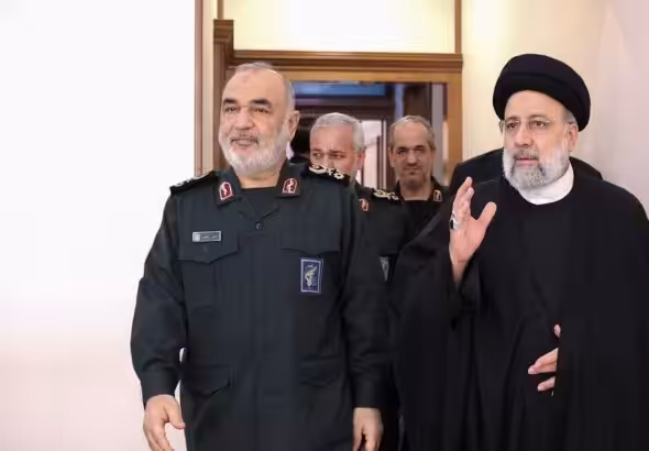 Iranian President Ebrahim Raisi (right) and Commander-in-chief of the Army of the Guardians of the Islamic Revolution Hossein Salami (left) walking together. Photo: Iranian Presidency.