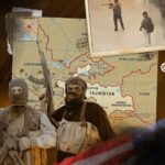 Heavily armed fighters (center) with a map of Central Asia in the background and a photo of the shouters in the Crocus Moscow terrorist attack and a US flag. Photo: Al Mayadeen illustration by Zeinab El-Hajj.