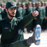 An Iranian Revolutionary Guard officer, with the Israeli flag drawn on his boots, is seen during the graduation ceremony, held for military cadets at a military academy, in Tehran, Iran, June 30, 2018. Photo: Reuters.
