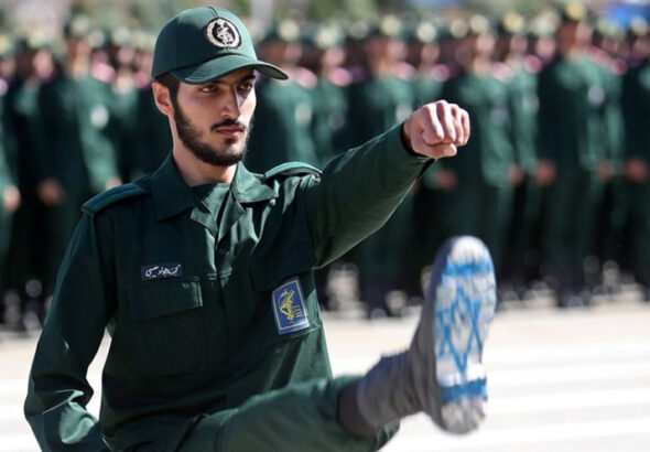 An Iranian Revolutionary Guard officer, with the Israeli flag drawn on his boots, is seen during the graduation ceremony, held for military cadets at a military academy, in Tehran, Iran, June 30, 2018. Photo: Reuters.