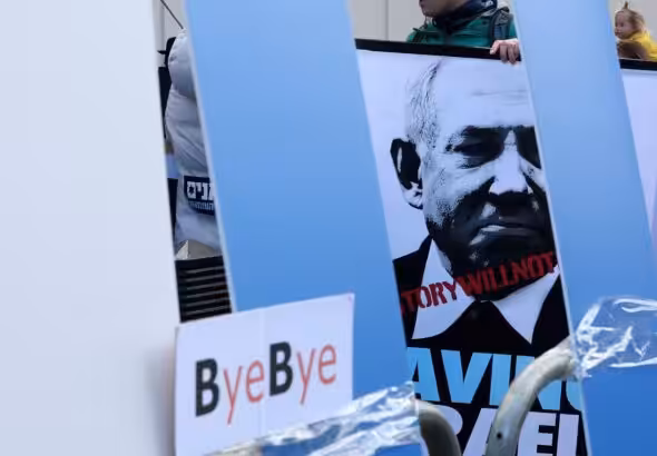 Demonstrators protest in Whitehall, London, following a visit by Benjamin Netanyahu to meet with Britain's Prime Minister Rishi Sunak at Downing Street, March 24, 2023. Photo: AFP.