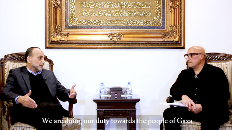 Ammar Al-Moussawi (left), director of International Relations of Hezbollah's political wing, interviewed by Dimitri Lascaris (right), lawyer, journalist and activist. Photo: Hadi Hoteit.