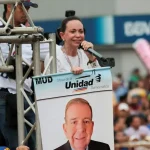 Far-right Venezuelan politician María Corina Machado holding  a poster for the PUD candidate Edmundo González, during a political rally in Maracaibo, Zulia state. Photo: X/@ReporteYa.