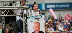 Far-right Venezuelan politician María Corina Machado holding  a poster for the PUD candidate Edmundo González, during a political rally in Maracaibo, Zulia state. Photo: X/@ReporteYa.