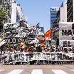 Protestors holding national strike banners during a demonstration in Buenos Aires in 2022. Photo: El Polo Obrero/file photo.