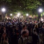 People react as protesters link arms outside Hamilton Hall barricading students inside the building at Columbia University in New York City, US, April 30, 2024. Photo: Reuters.