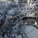 Destroyed buildings caused by Israeli bombing on the Zuwaida area in the central Gaza Strip. Photo: AFP.