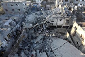Destroyed buildings caused by Israeli bombing on the Zuwaida area in the central Gaza Strip. Photo: AFP.