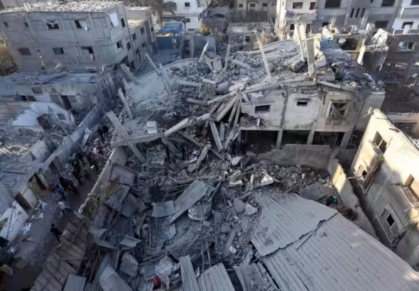 Destroyed buildings caused by Israeli bombing on the Zuwaida area in the central Gaza Strip. Photo: AFP.