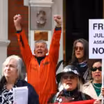 Protesters demand the release of WikiLeaks founder Julian Assange. Photo: Peter Nicholls/Getty Images.