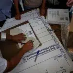Polling station members, many of them allegedly belonging to María Corina Machado's controlled NGO Sumate, counting votes during the closing of the controversial opposition primaries, in Caracas, Venezuela, October 2023. Photo: Miguel Gutiérrez/EFE/File photo.