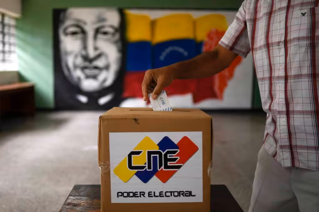 A man participates in a mock election in Caracas, Venezuela, on October 25, 2020. Photo: Matias Delacroix/AP.