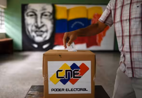 A man participates in a mock election in Caracas, Venezuela, on October 25, 2020. Photo: Matias Delacroix/AP.