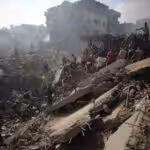 Palestinians search for survivors and victims under the rubble of buildings destroyed in the Israeli bombing of Bureij refugee camp in central Gaza Strip, November 2, 2023. Photo: AFP.