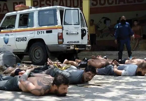 US, Colombian, and Venezuelan mercenaries, captured by Venezuelan police and military, lying on the floor in front of the House of Socialist Fishermen in Chuao, Aragua state, on May 3, 2020. Photo: Telesur/File photo.
