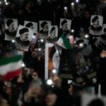 Mourners hold posters of the late Iranian President Ebrahim Raisi at the Imam Khomeini Grand Mosque compound in Tehran, May 21, 2024. Photo: AP.