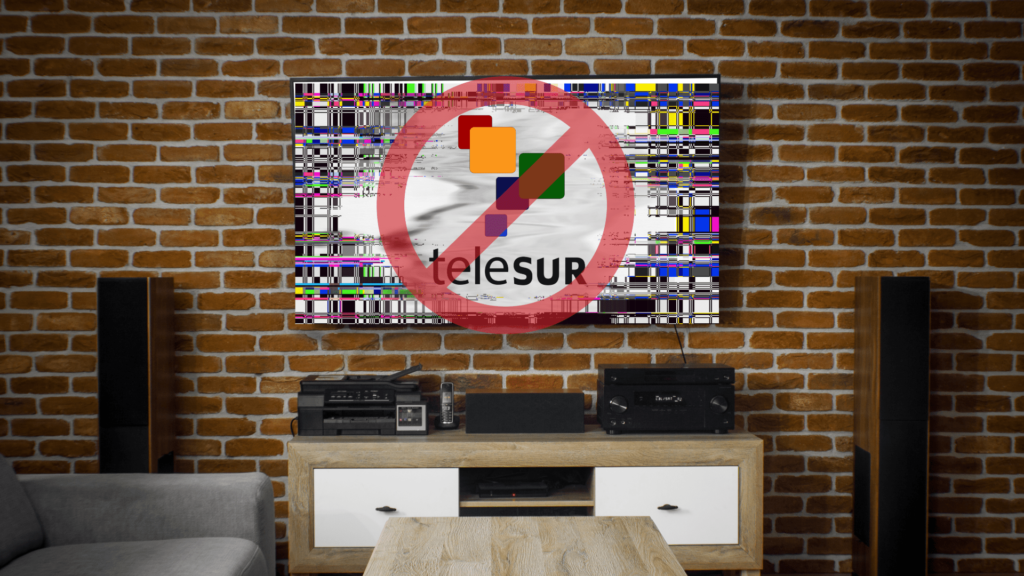 A Telesur logo on a TV screen with the cancel sign on it. Photo: RedRadioVE.