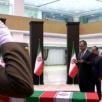 Venezuelan Foreign Minister Yván Gil, escorted by the Venezuelan ambassador in Iran, José Rafael Silva, paying tribute to the martyred Iranian President Ebrahim Raisi in Tehran, Iran, on Wednesday, May 22, 2024. Photo: Venezuelan Ministry for Foreign Affairs.