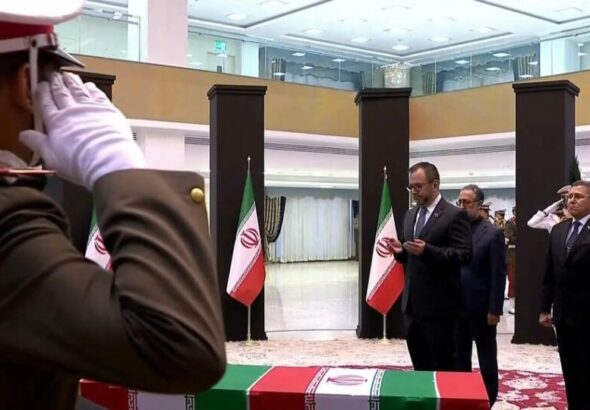 Venezuelan Foreign Minister Yván Gil, escorted by the Venezuelan ambassador in Iran, José Rafael Silva, paying tribute to the martyred Iranian President Ebrahim Raisi in Tehran, Iran, on Wednesday, May 22, 2024. Photo: Venezuelan Ministry for Foreign Affairs.