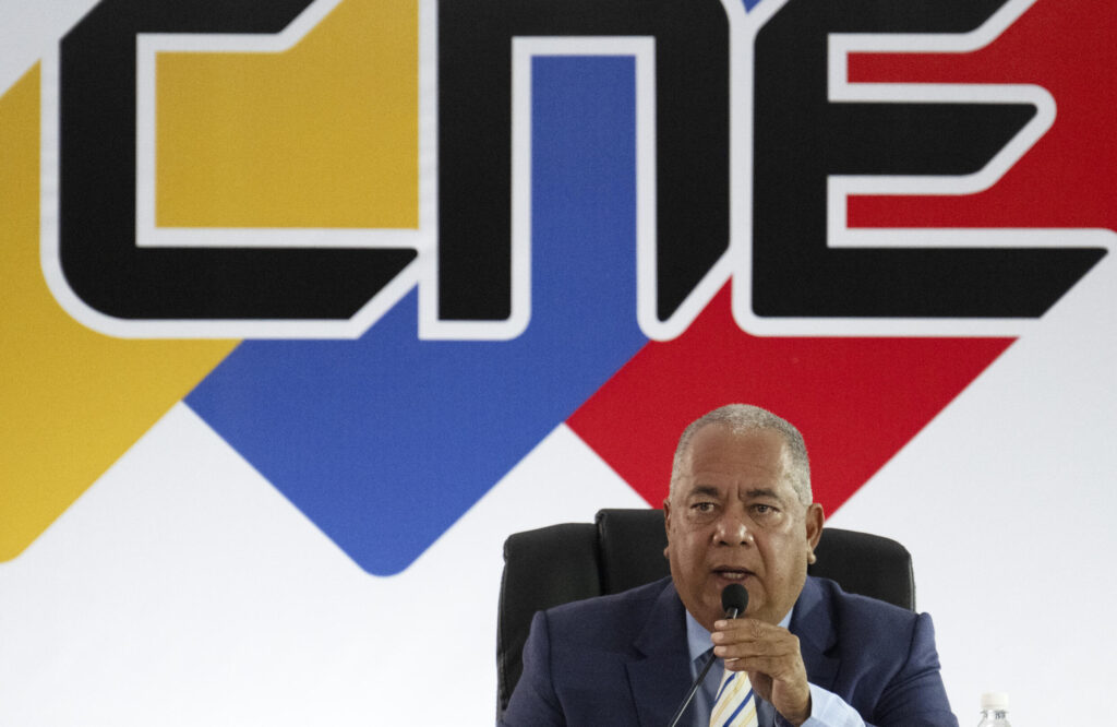 Venezuela's National Electoral Council president, Elvis Amoroso, announcing the decision to the press to revoke the invitation to the European Union of participation as electoral observers in the upcoming July 28 presidential elections. Photo: Federico Parra/AFP.