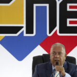 Venezuela's National Electoral Council president, Elvis Amoroso, announcing the decision to the press to revoke the invitation to the European Union of participation as electoral observers in the upcoming July 28 presidential elections. Photo: Federico Parra/AFP.