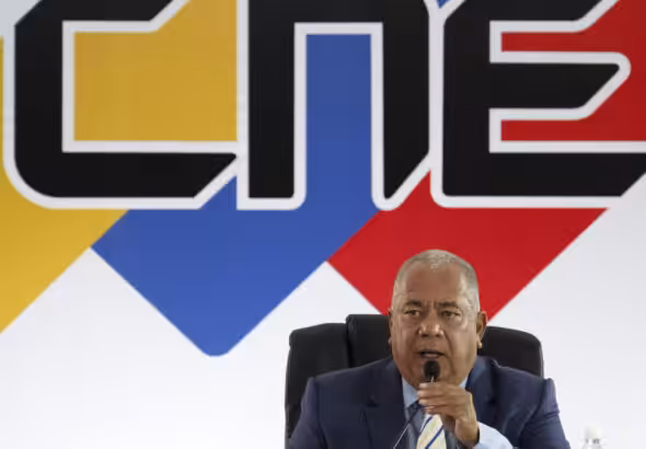 Venezuela's National Electoral Council president, Elvis Amoroso, announcing the decision to the press to revoke the invitation to the European Union of participation as electoral observers in the upcoming July 28 presidential elections. Photo: Federico Parra/AFP.