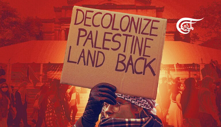 Female student showing a sign that says: Decolonize Palestine, Land Back. Photo: Mahdi Rteil for Al Mayadeen English.