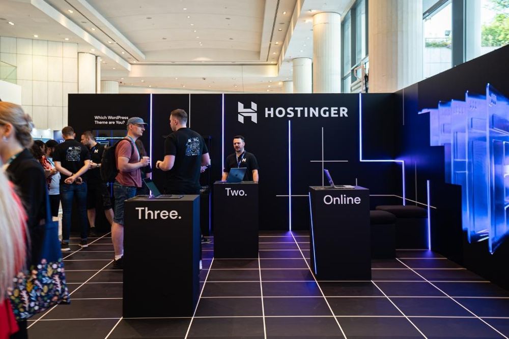 Featured image: Hostinger booth at WordCamp 23' Athens. Photo: Glassdoor/File photo.