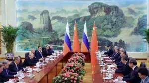 High level meeting of the Russian delegation, led by President Vladimir Putin, and the Chines delegation, led by President Xi Jinping. Photo: Konstantin Zavrazhin/EFE/EPA.
