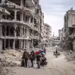 Palestinians start to return to their homes amid destruction after Israel’s withdrawal in Khan Younis, Gaza, on April 7. Photo: Jehad Alshrafi/Anaudolu via Getty images.