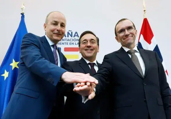 Ireland's Foreign Minister Micheal Martin (Left), Spain's Foreign Minister Jose Manuel Albares Bueno (Middle) and Norway's Foreign Minister Espen Barth Eide (Right) pose for a photo, at the end of a media conference, during talks on the Middle East, in Brussels, on May 27. Photo: Geert Vanden Wijngaert/Associated Press.