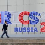 A man walks outside the venue hosting the BRICS foreign ministers meeting, in Nizhny Novgorod, Russia, June 9, 2024. Photo: Reuters.