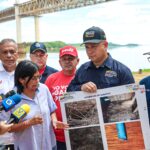 Venezuelan Vice President Delcy Rodríguez and Minister for Transportation Ramón Velásquez providing information about the sabotage against the Angostura Bridge over the Orinoco River (in the background), Ciudad Bolívar, Bolívar state June 25, 2024. Photo: X/@ViceVenezuela.