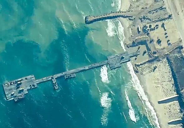 Aerial view of the US "aid pier" in Gaza, used by the Zionist regime to massacre Palestinians. Photo: US Central Command.