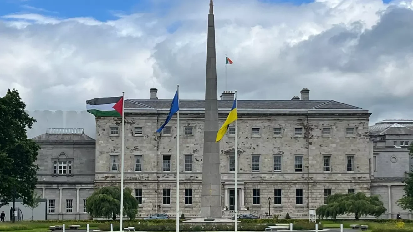 A Palestinian flag alongside EU and Ukrainian flags outside Leinster House in Dublin to mark Ireland's recognition of a Palestinian state, May 28, 2024. Photo: Peter Murphy/AFP.