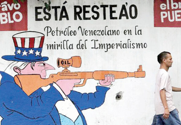 A political cartoon shows the US targeting Venezuela for its oil resources. Photo: contrainfo.com.