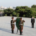 Russian President Vladimir Putin and North Korean leader Kim Jong-un lay flowers at a monument to Soviet soldiers who died during the liberation of Korea from Japan during World War II. Photo: Sputnik: Gavriil Grigorov.