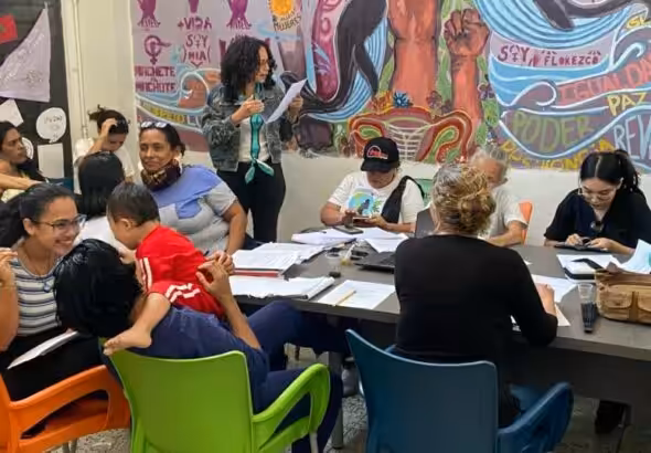 A meeting at the communal house of the women's collective Reunião Tramuco, Caracas, Venezuela. Photo: Bianca Pessoa.