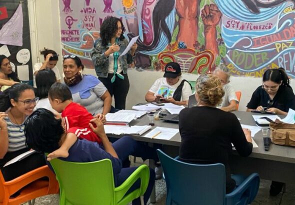 A meeting at the communal house of the women's collective Reunião Tramuco, Caracas, Venezuela. Photo: Bianca Pessoa.