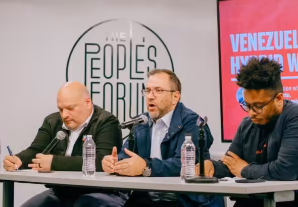 Venezuelan FM Yván Gil Pinto with Carlos Ron and Manolo De Los Santos. Photo: Wyatt Souers.