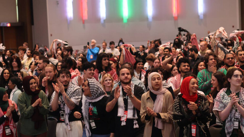Attending activists, organizers and people applauding the conclusion of the People's Conference for Palestine, Detroit, USA, May 26, 2024. Photo: Liberation News.