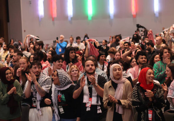 Attending activists, organizers and people applauding the conclusion of the People's Conference for Palestine, Detroit, USA, May 26, 2024. Photo: Liberation News.