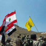 Hezbollah fighters and Syrian army units take control of a position outside Qalamoun at the Syria-Lebanon border during a battle with ISIS in 2017. Photo: Al-Manar TV.