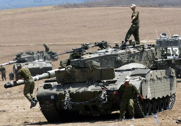 Israeli tanks are positioned near kibbutz Kfar Aza. Photo: Sputnik/file photo.