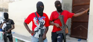 Soldiers of Jimmy Cherizier’s Revolutionary Forces of the G9, now part of the larger Viv Ansanm alliance, in lower Delmas in March 2024. Armed groups have emerged in Haiti’s working-class ghettos due to the Haiti’s ruling class’ criminal policies. Photo: Odelyn Joseph/AP.