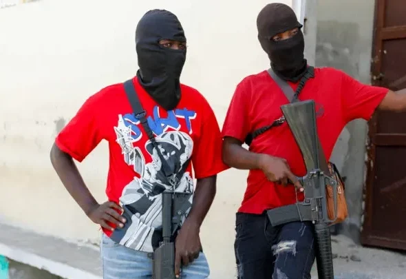 Soldiers of Jimmy Cherizier’s Revolutionary Forces of the G9, now part of the larger Viv Ansanm alliance, in lower Delmas in March 2024. Armed groups have emerged in Haiti’s working-class ghettos due to the Haiti’s ruling class’ criminal policies. Photo: Odelyn Joseph/AP.