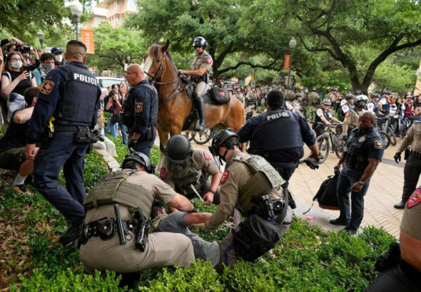 Texas state troopers arrest a man at a pro-Palestinian protest at the University of Texas, during the ongoing conflict between Israel and the Palestinian resistance movement Hamas, in Austin, Texas, the United States, on April 24, 2024. Photo: Reuters.