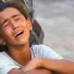 Relatives of 10-year-old Palestinian Mustafa Hijazi, who died due to malnutrition and lack of medication, mourns in Deir al-Balah, Gaza on June 14, 2024. Photo: Ashraf Amra/Anadolu Agency.