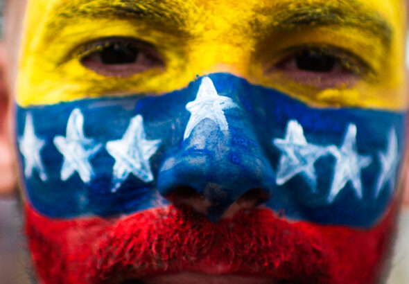 Feature photo | Venezuelan citizens in Colombia wear patriotic clothes and makeup during the 2024 presidental elections of Venezuela, in Bogota, Colombia, July 28, 2024. Photo: Sebastian Barro/AP.