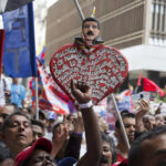 Supporters of Venezuela’s President Nicolas Maduro gather outside the National Electoral Council in Caracas, Venezuela, May 2, 2018. Photo: Ricardo Mazalan/AP.